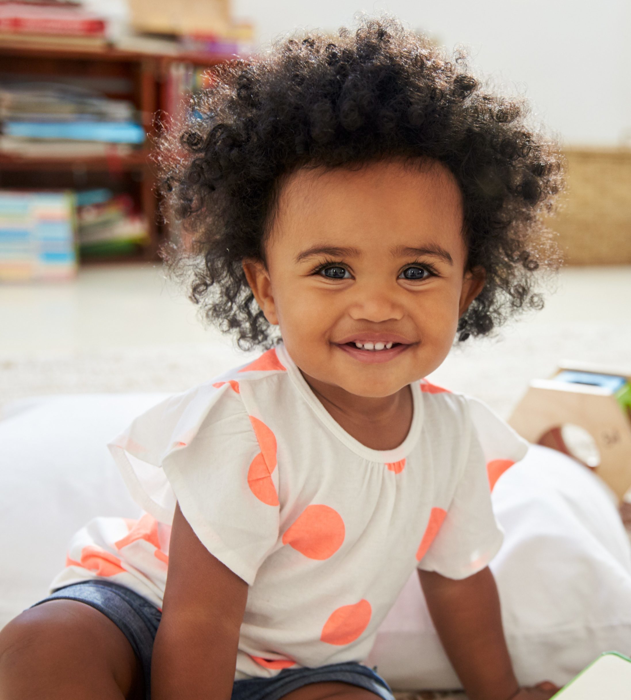 Portrait,Of,Happy,Baby,Girl,Playing,With,Toys,In,Playroom newborn feet | Sanger Pediatrics